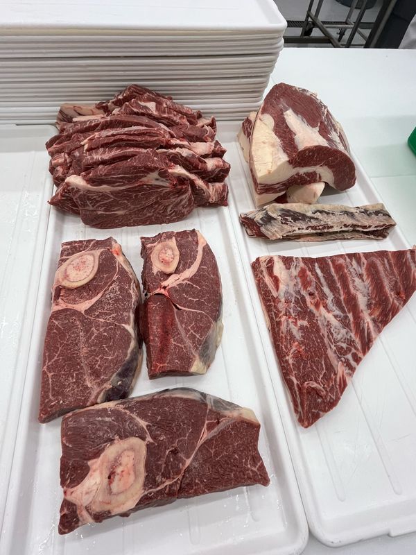 A table spread of Akaushi Wagyu steaks and roasts from our family farm