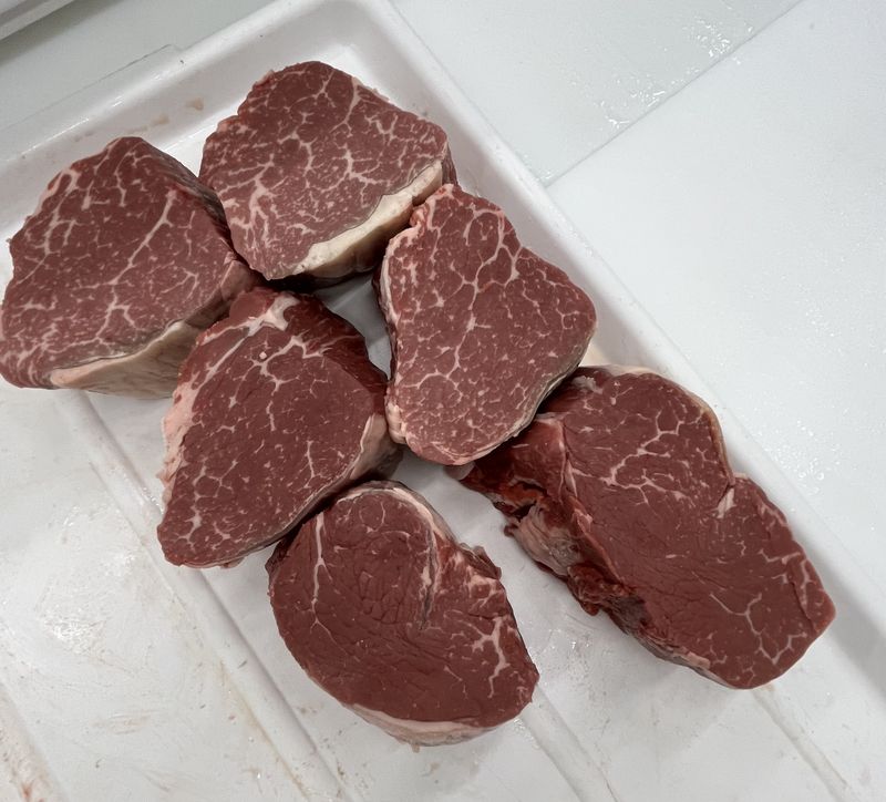Four thick-cut Akaushi Wagyu filets from our family farm on butcher paper