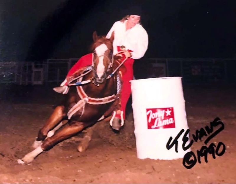 Merrill G. Frost turning a barrel on a sorrel horse with a blaze, 1990